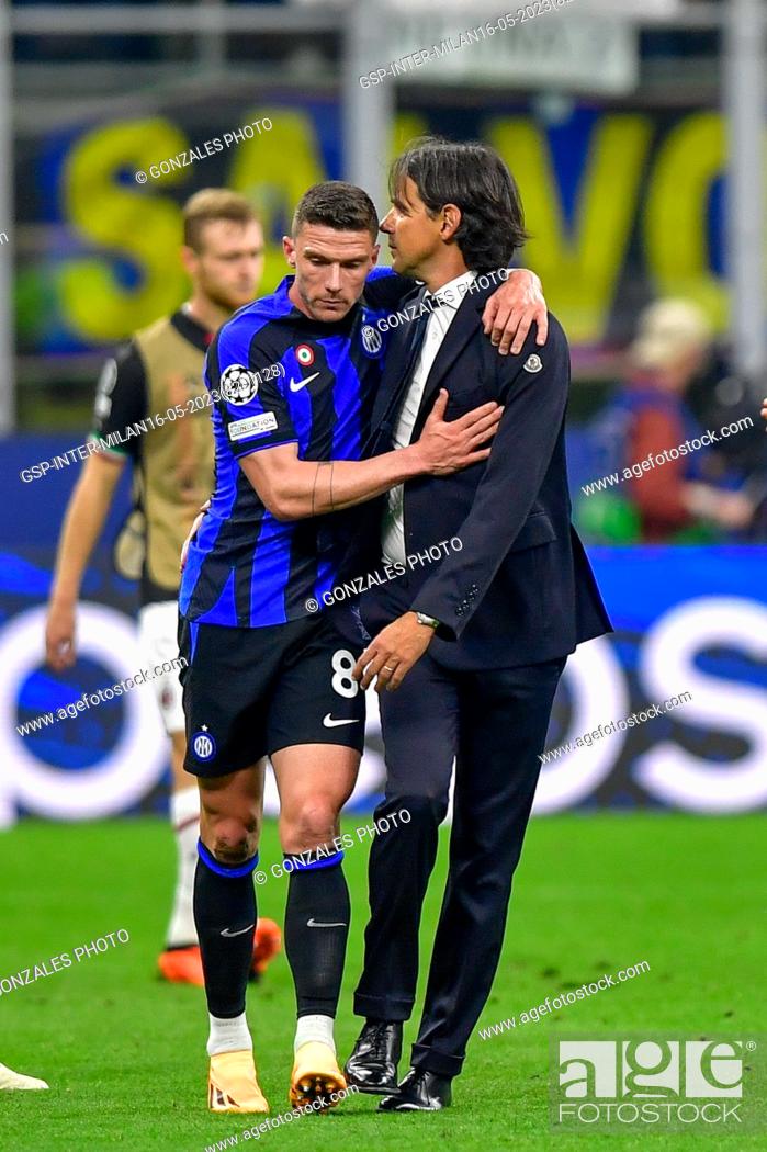 Stock Photo: Milano, Italy. 16th, May 2023. Head coach Simone Inzaghi of Inter seen with Robin Gosens (8) after the UEFA Champions League match between Inter and AC Milan at.
