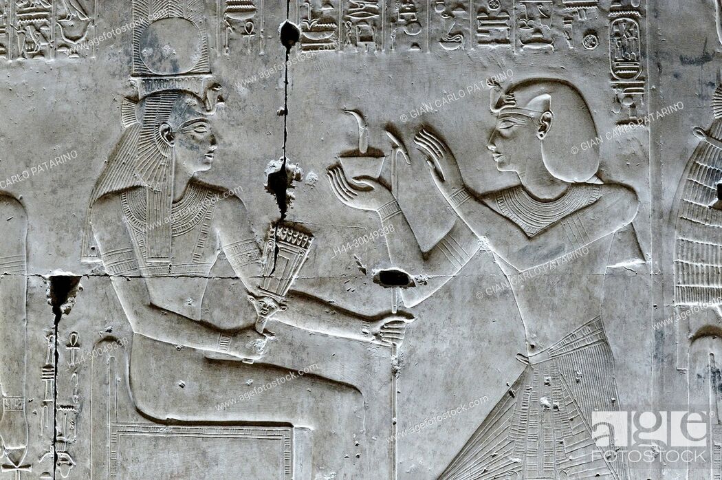 Stock Photo: Abydos, Egypt, the mortuary temple of pharaoh Seti I, Menmaatra, (XIX° dyn. 1321-1186 B.C.) - the king incense the goddess Mut.