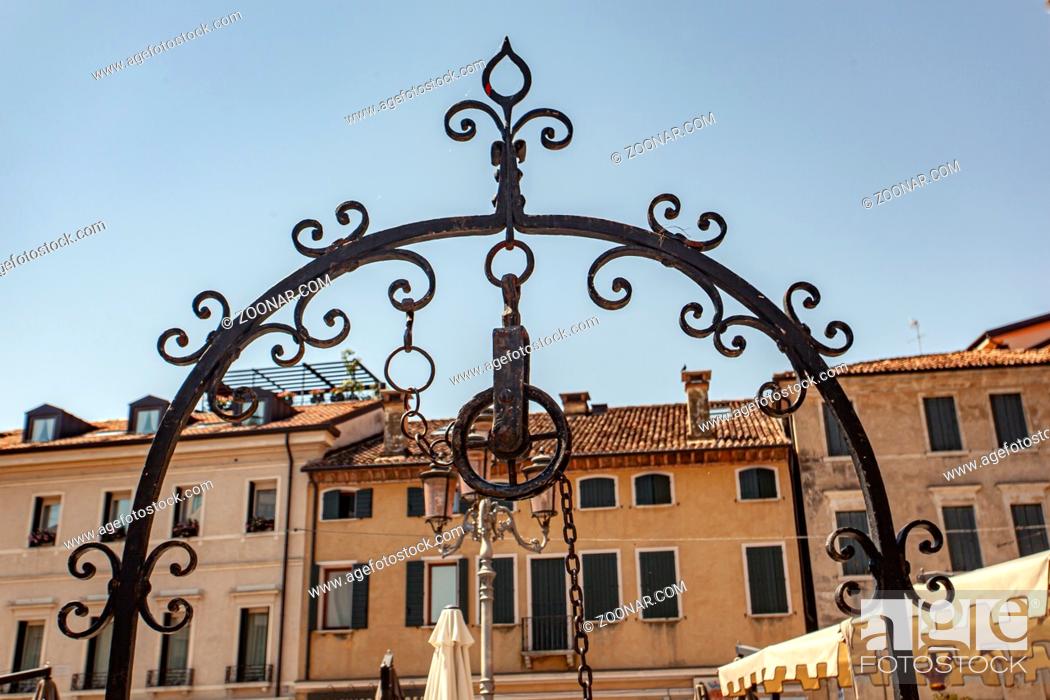 Stock Photo: Detail of San Vito square in Treviso in Italy under a blue sky.