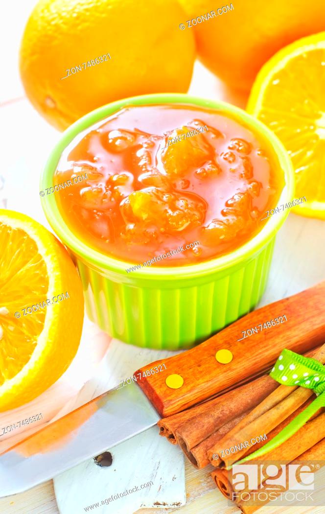 Stock Photo: jam and oranges.