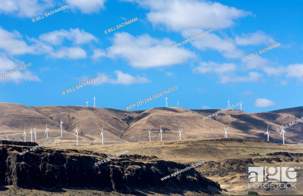 Stock Photo: Oregon Wind Power Turbines near The Dalles on highway and mountains for green ecology.