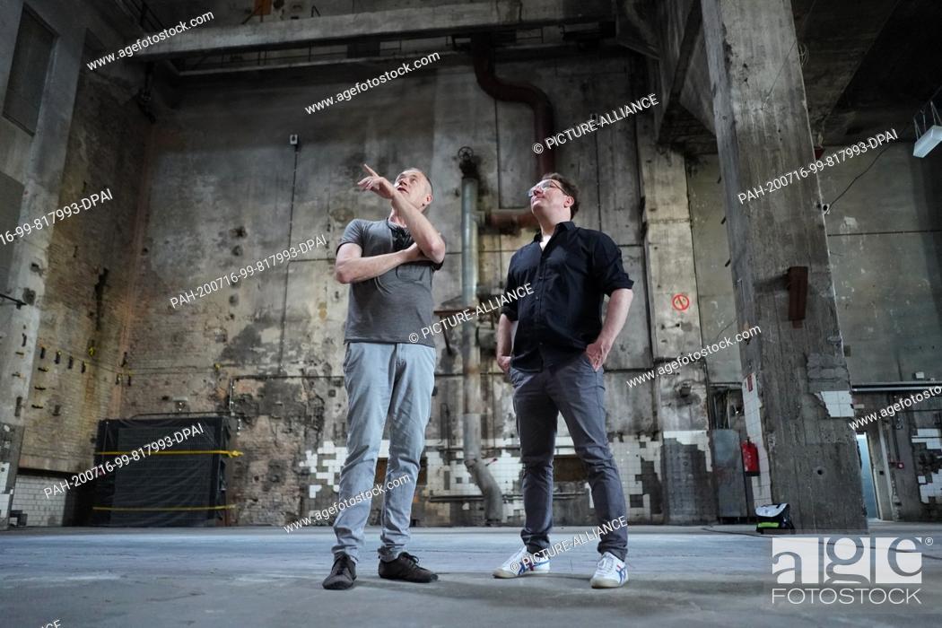 Stock Photo: 14 July 2020, Berlin: The artists Hannes Strobl (r) and Sam Auinger are standing in the sound installation ""Eleven Songs"" in the Halle am Berghain.