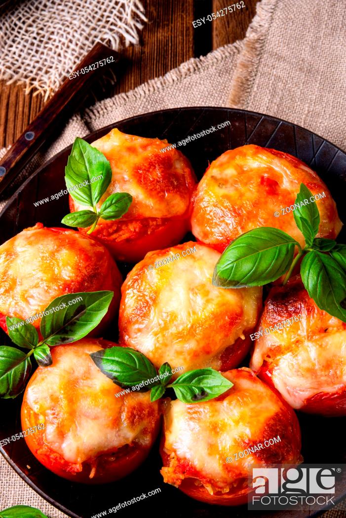 Stock Photo: Stuffed tomatoes with minced meat and cheese.