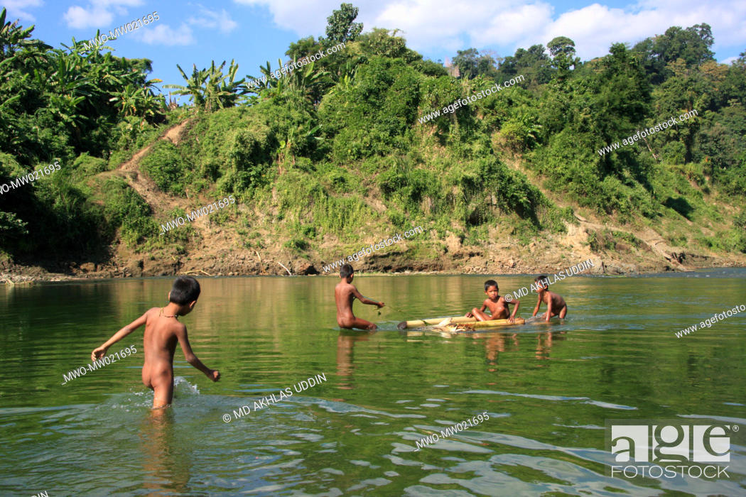 Stock Photo: Children playing in the Sangu river in Thanchi in Bandarban, Bangladesh December 2, 2009.