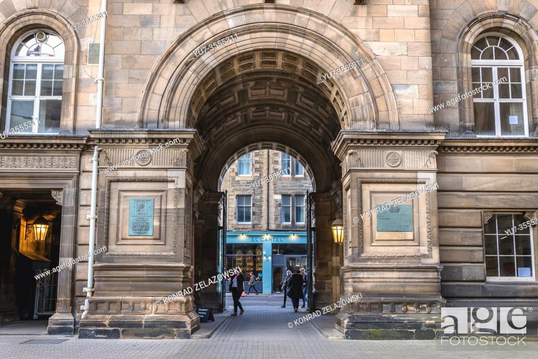 Stock Photo: El Cartel restaurant and gate of one of building of University of Edinburgh in Edinburgh, the capital of Scotland, part of United Kingdom.