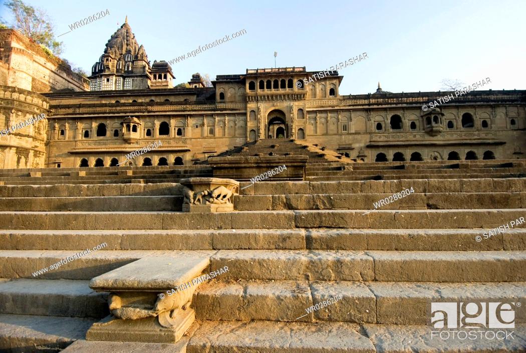 Stock Photo: Maheshwar ghat temple fort and palace on bank of river Narmada , Madhya Pradesh , India.