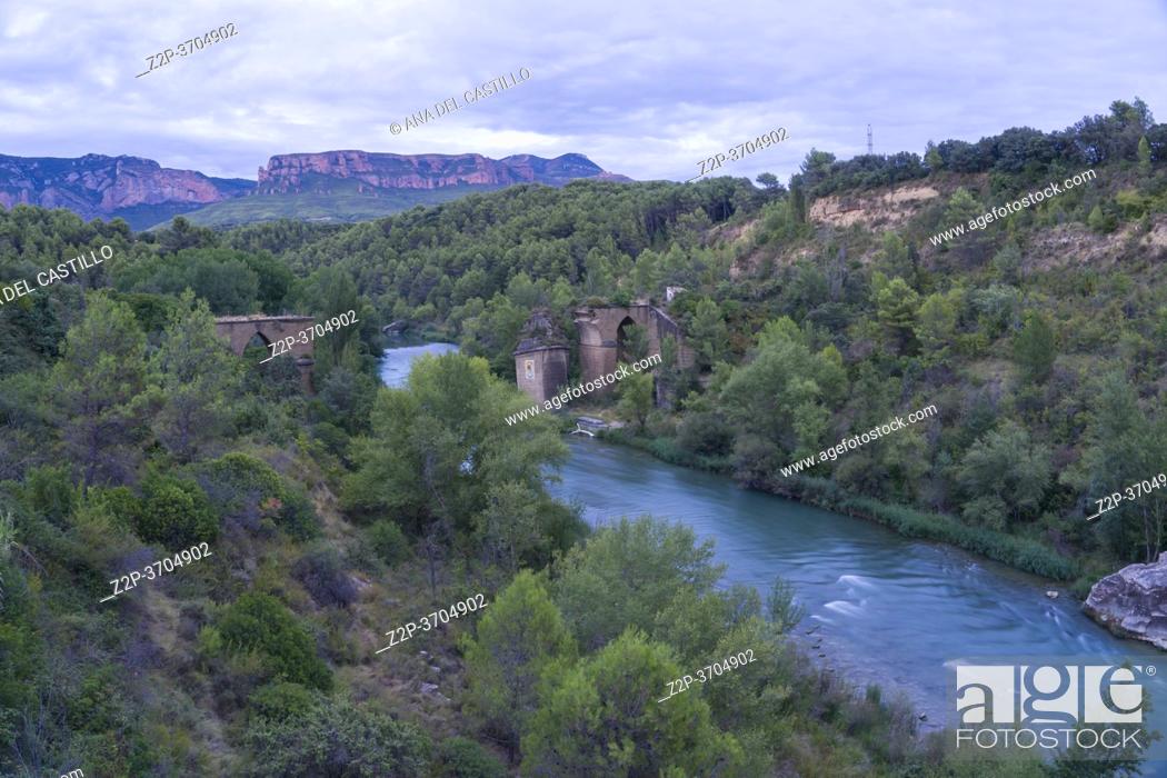Stock Photo: Destroyed Bridge over the River Gallego in the Murillo de Gallego Huesca Aragon Spain on August 18, 2020.