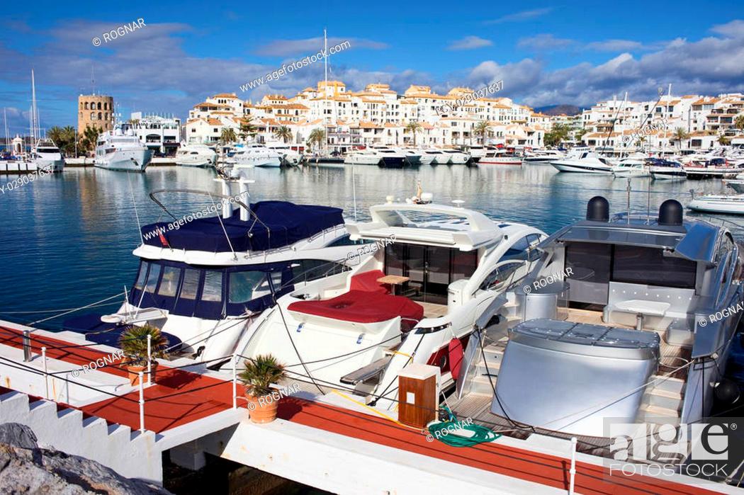 Alerta nacido Ejecución Marina with luxury yachts in resort town of Puerto Banus on Costa del Sol  in Spain, near Marbella, Foto de Stock, Imagen Low Budget Royalty Free Pic.  ESY-029037637 | agefotostock