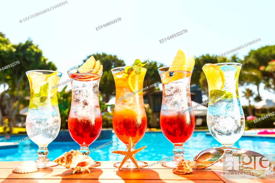 Stock Photo: Craft cocktails near the pool. Vacation, summer, holiday, luxury resort concept. Horizontal.