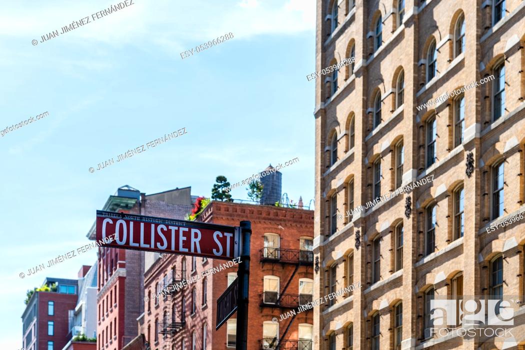 Stock Photo: Low angle view of Collister Street name sign against luxury apartment buildings in Tribeca North District of New York City.