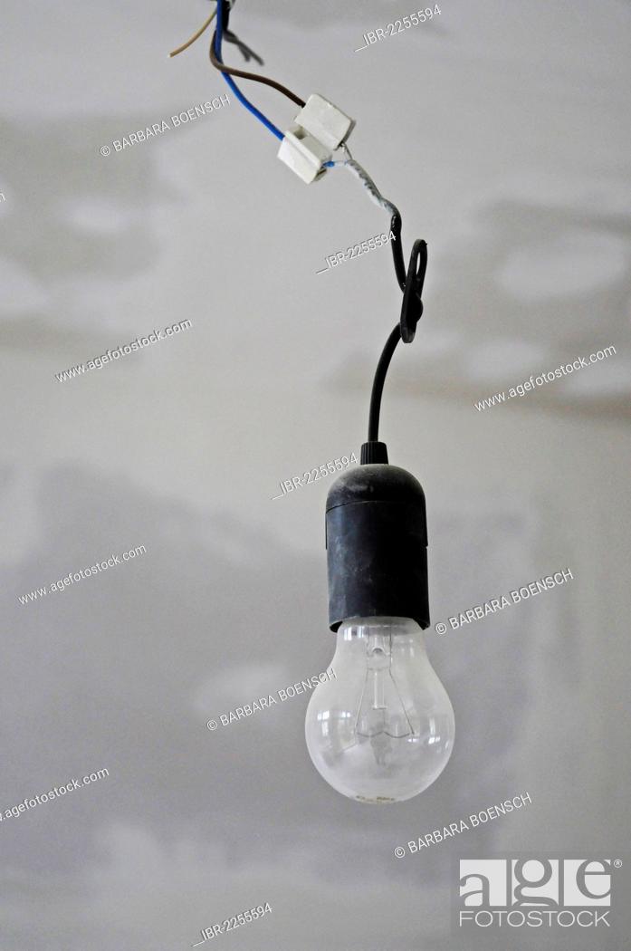Single Light Bulb Hanging From A Ceiling Building Renovation Germany Europe Stock Photo Picture And Rights Managed Image Pic Ibr 2255594 Agefotostock - How To Fit A Ceiling Light Germany