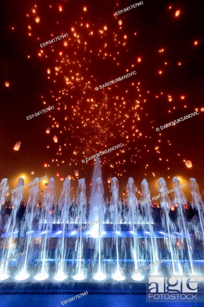 Stock Photo: New fountains on entrance to downtown of city of Zagreb, Croatia with Christmas lanterns in night sky.