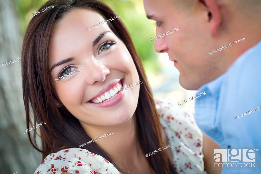 Stock Photo: Happy Mixed Race Romantic Couple Portrait in the Park.