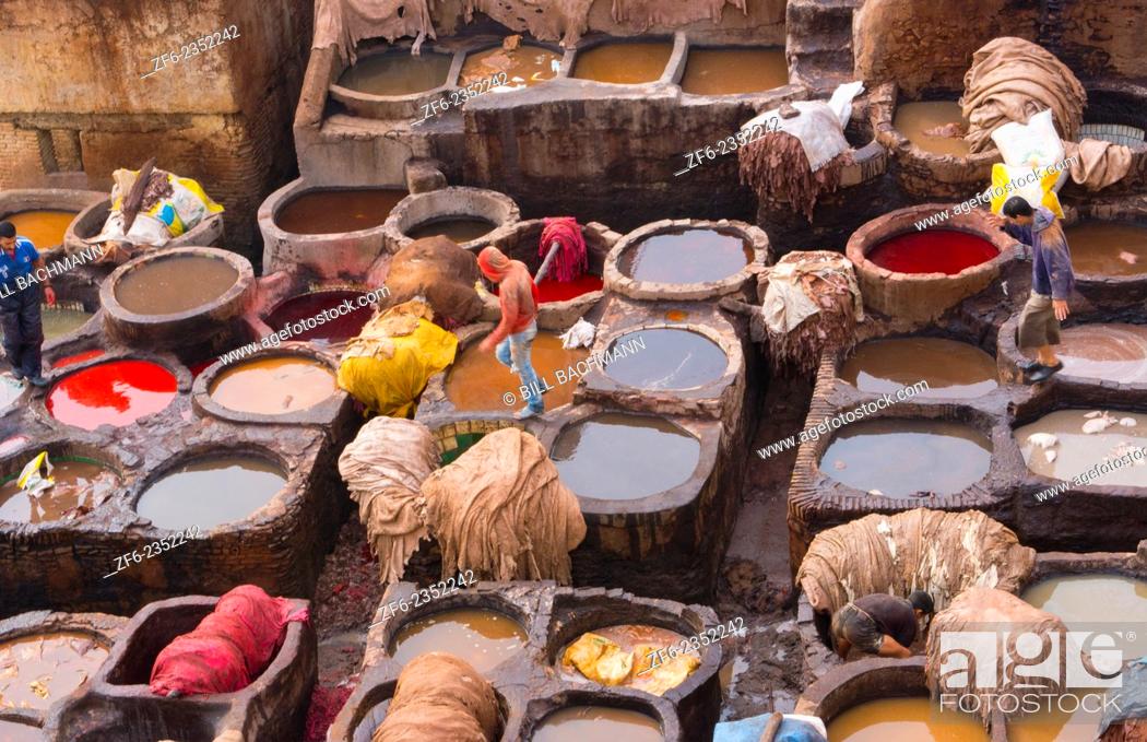 Stock Photo: Fez Morocco old Tannery called Chouara Tannery which is almost 1000 years old from above of tannery vats with color dyes.
