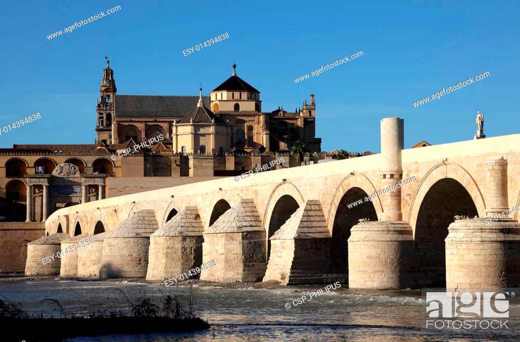 Stock Photo: Roman Bridge with the Cathedral-Mosque of Cordoba in the background. Andalusia, Spain.