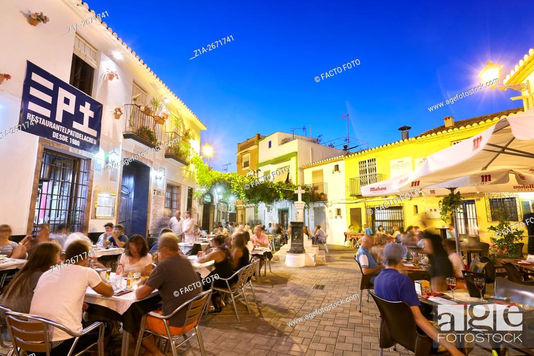 Stock Photo: Restaurant terraces at the Port district by night. Denia. Alicante. Valencia Community. Spain.