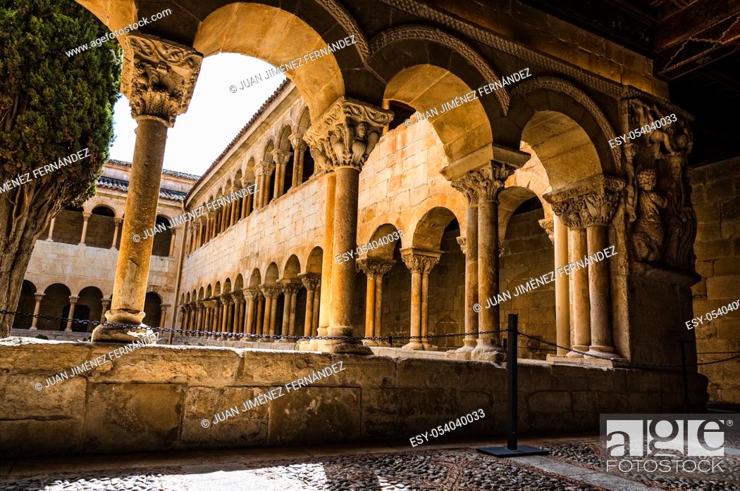 Stock Photo: Santo Domingo de Silos, Spain - April 16, 2019: The cloister of Santo Domingo de Silos Abbey. It is a Benedictine monastery and a masterpiece of Romanesque art.