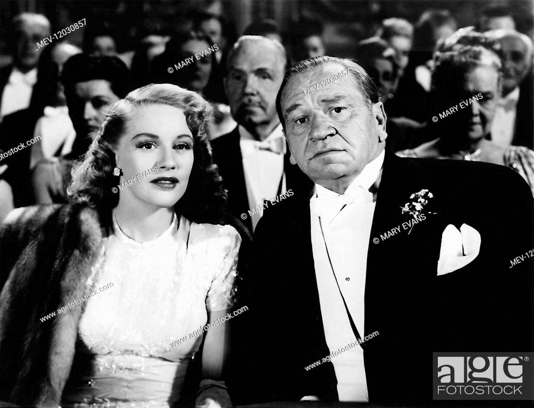 Stock Photo: Gladys George & Wallace Beery Characters: Madge Parkson, Jim Breedin Film: Alias A Gentleman (1944) Director: Harry Beaumont 03 February 1948.