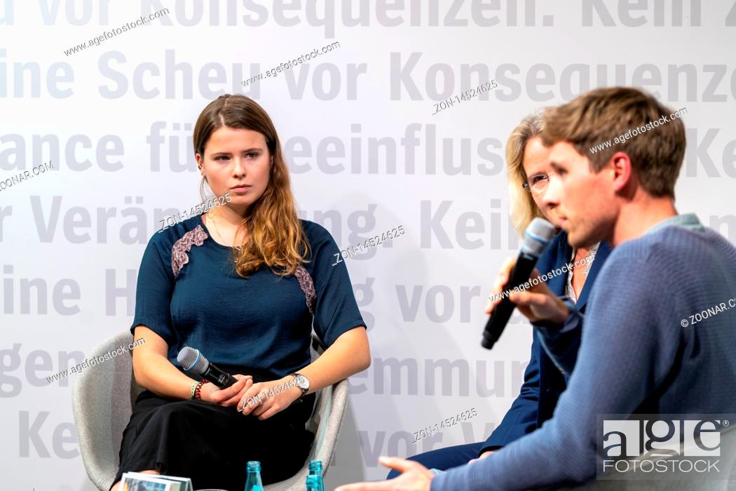 Stock Photo: FRANKFURT AM MAIN, Germany - October 18 2019: Alexander Repenning and Luisa Neubauer talking on stage at 71st Frankfurt Book Fair / Buchmesse Frankfurt.