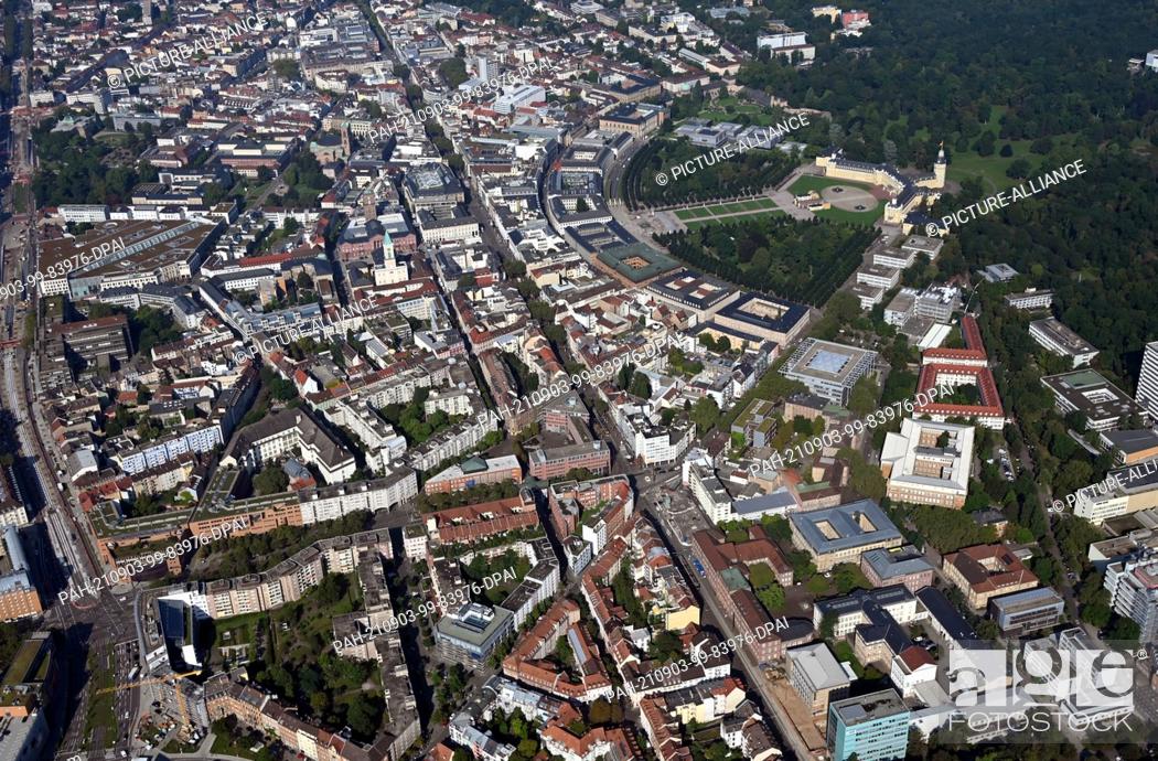 Stock Photo: 01 September 2021, Baden-Wuerttemberg, Karlsruhe: Aerial view (taken from an airplane) of downtown Karlsruhe with the Karlsruhe Castle.