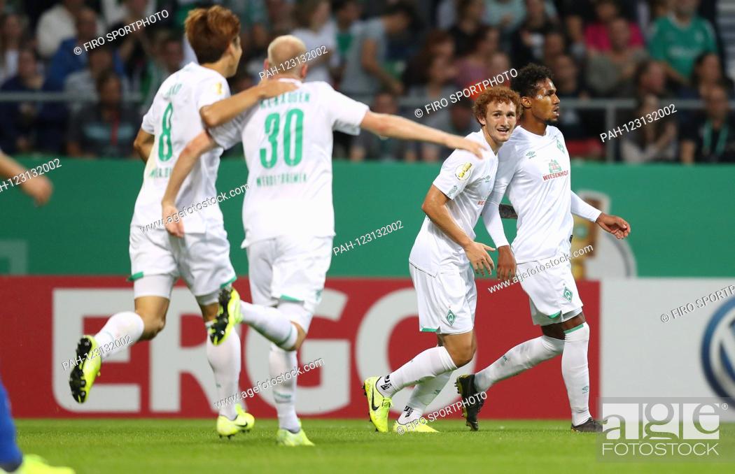 Stock Photo: firo: 10.08.2019 Football, 2019/2020 DFB Pokal 1st round Atlas Delmenhorst - Werder Bremen goal jubilation 1: 0 for Werder Yuya Osako with Davy Klaassen.