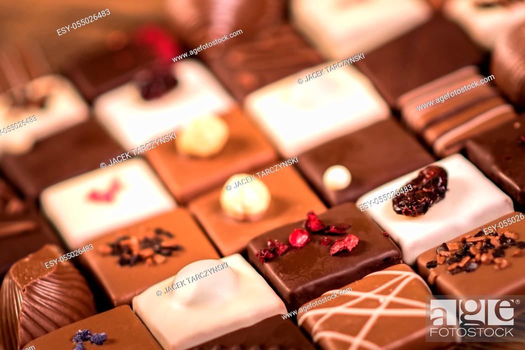 Stock Photo: Assortment of fine chocolate candies, white, dark and milk chocolate.