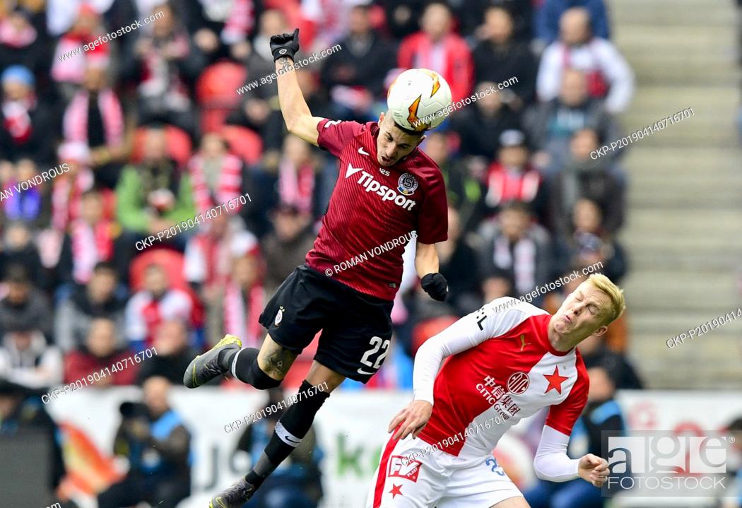 Stock Photo: L-R Srdjan Plavsic (Sparta) and Michal Frydrych (Slavia) in action during the Czech first soccer league (Fortuna Liga), 28th round.