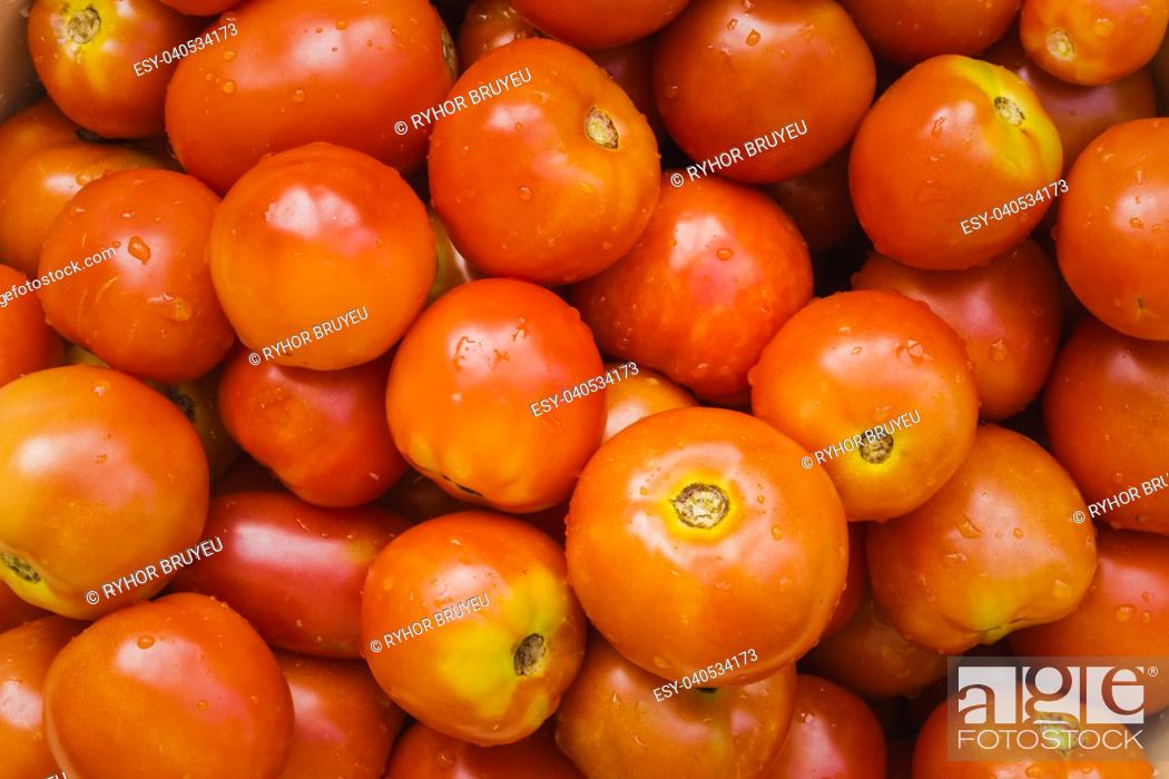 Stock Photo: Organically Grown Fresh Red Cherry Tomatoes Background.