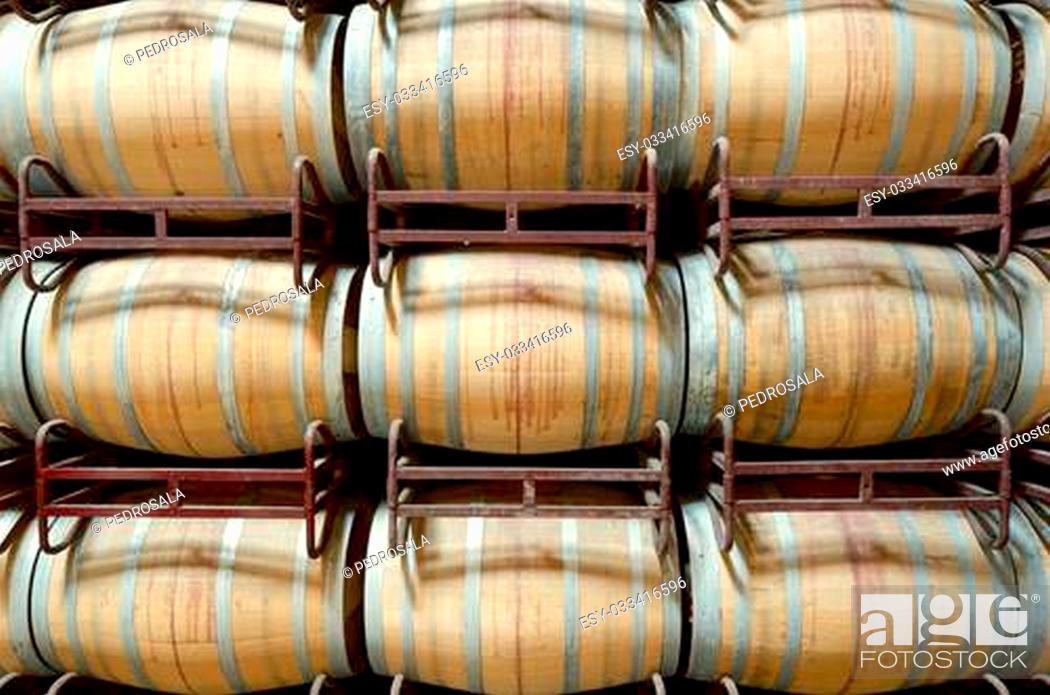 Stock Photo: stacked wine barrels to ferment the wine, La Rioja, Spain.