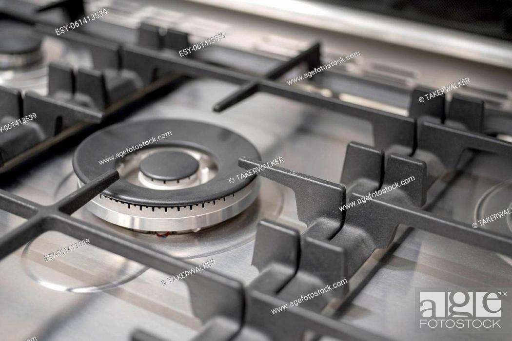 Stock Photo: Close up of gas stove kitchen home modern.