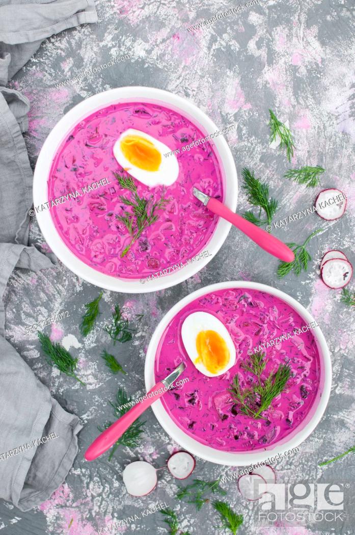 Stock Photo: Cold soup made with kefir, yoghurt, sour cream and beet root, served with boiled egg.