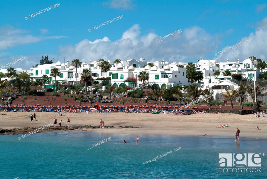 Stock Photo: Sea, Beach, Vacation, Hotel, Travel, Spain, Island, Tourism, Building, Screen, Development, Apartment, Flat, Playa, Geography, Read, Costa, Lanzarote, Touristic, Chaise, Teguise, Longues, Canarian, Cucharas, Studio Shot, Costa Teguise, Canary Islands