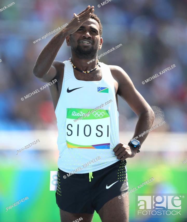 Stock Photo: Rosefelo Siosi of Solomon Islands competes in Men's 5000m Round 1 heat of the Athletic, Track and Field events during the Rio 2016 Olympic Games at Olympic.