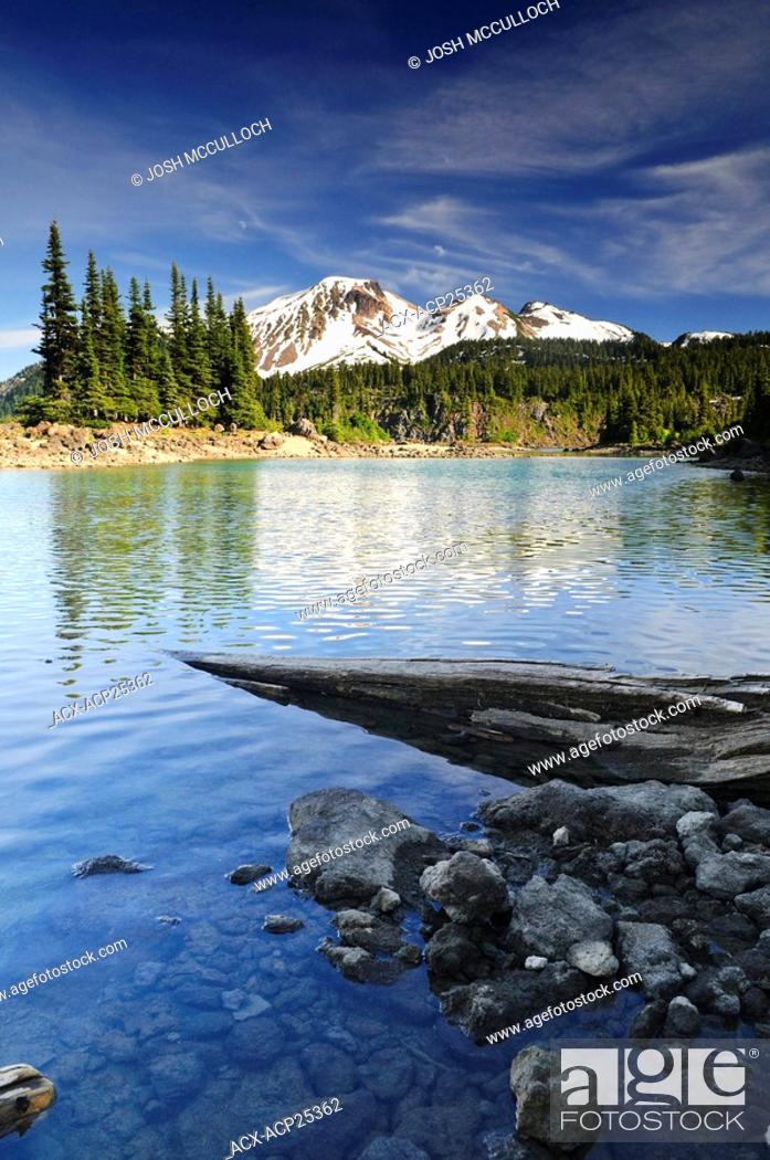 Stock Photo: Mount Price and Clinker Peak provide a beautiful backdrop to Garibaldi Lake and the Battleship Islands in Garibaldi Provincial Park near Whistler BC.