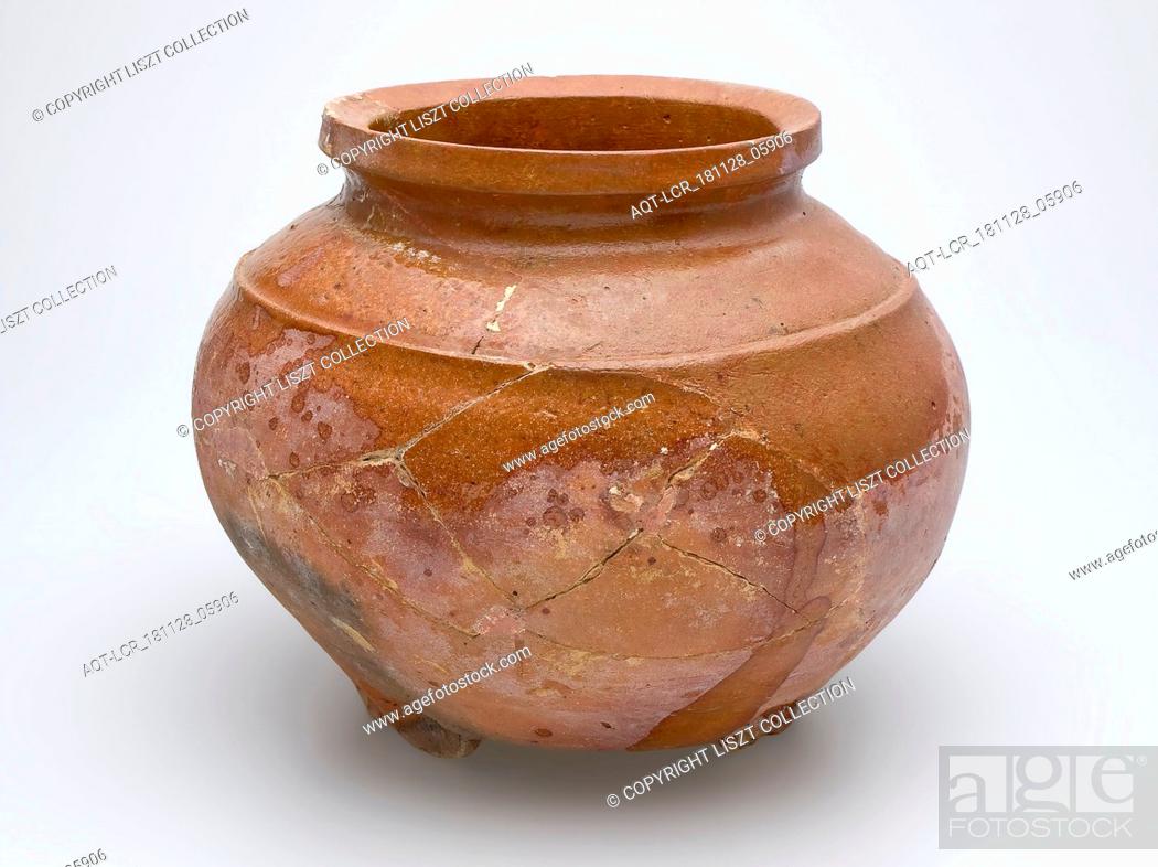 Stock Photo: Low pot of red pottery on stand fins with sparing lead glaze, ledge over the shoulder, storage jar pot holder soil find ceramic earthenware glaze lead glaze.