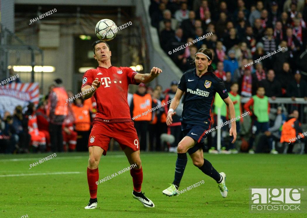Stock Photo: Munich's Robert Lewandowski (L) in action against Madrid's Filipe Luis during the UEFA Champions League semi final second leg soccer match between Bayern Munich.