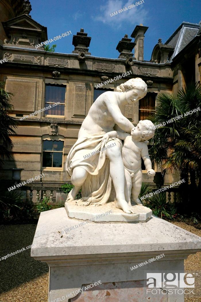 Stock Photo: View of a Roman style statue in the gardens of Waddesdon Manor, a country house in the village of Waddesdon. Built in the Neo-Renaissance style of a French.