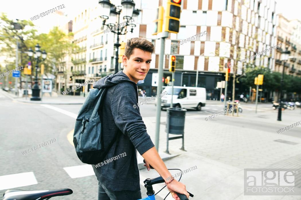Stock Photo: Teenager with a fixie bike in the city.