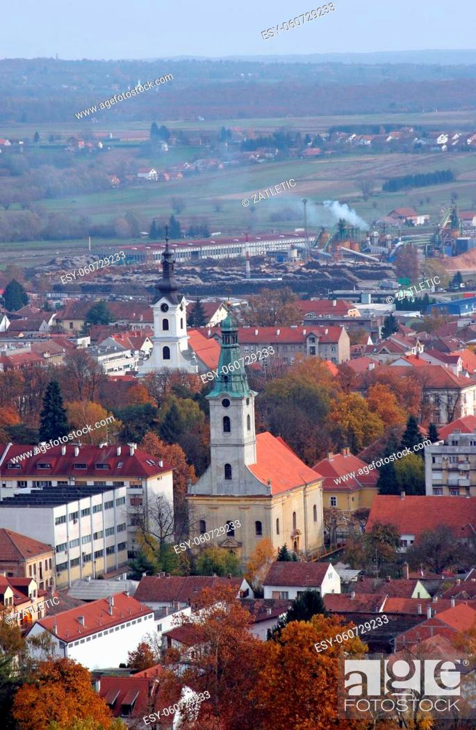 Stock Photo: Holy Trinity Orthodox Church and St. Theresa of Avila Catholic Cathedral in Bjelovar, Croatia.