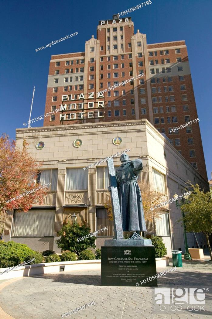 Stock Photo: Garcia de San Francisco statue with cross in front of Plaza Motor Hotel in Plaza district of El Paso, Texas.