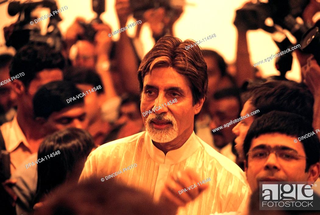 Stock Photo: South Asian Indian Bollywood actor Amitabh Bachchan at an exhibition of sculptor Arzan Khambatta at Jehangir art gallery ; Bombay Mumbai  ; Maharashtra ; India.