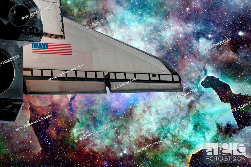 Stock Photo: Space Shuttle over galaxy and space nebula. Elements of this image furnished by NASA.