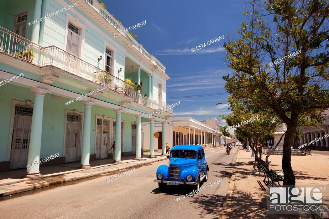 Stock Photo: Old American car at the main avenue-Paseo del Prado or so called Boulevard, Cienfuegos, Cuba, West Indies, Central America.