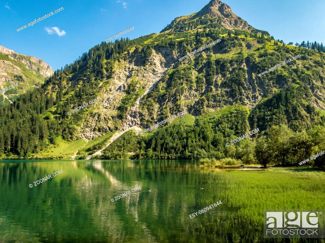 Stock Photo: Wonderful hike around the Vilsalpsee with a waterfall.