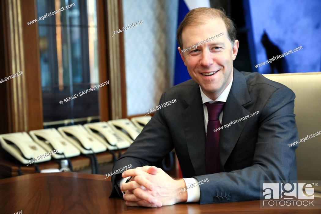 Stock Photo: RUSSIA, MOSCOW - MAY 5, 2023: Russia's Industry and Trade Minister Denis Manturov gives an interview to the TASS Russian News Agency.