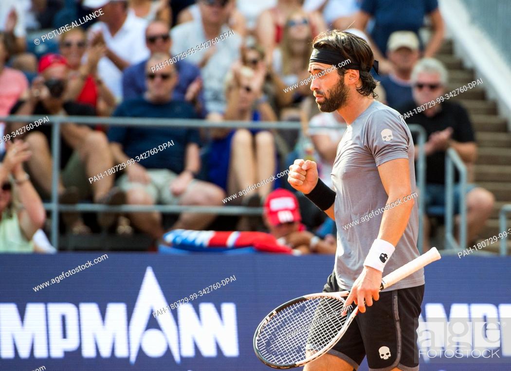 Stock Photo: 29 July 2018, Germany, Hamburg, Tennis ATP Tour German Open, singles, men, final in the tennis stadium at Rothenbaum: Basilashvili (Georgia) - Mayer (Argentina).