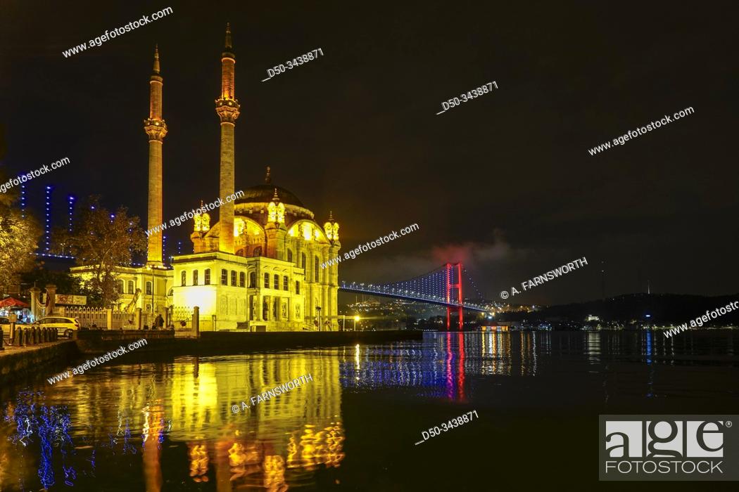 Stock Photo: Istanbul, Turkey The Ortakoy Mosque under the Bosphorus Bridge, known officially as the 15 July Martyrs Bridge and unofficially as the First Bridge.