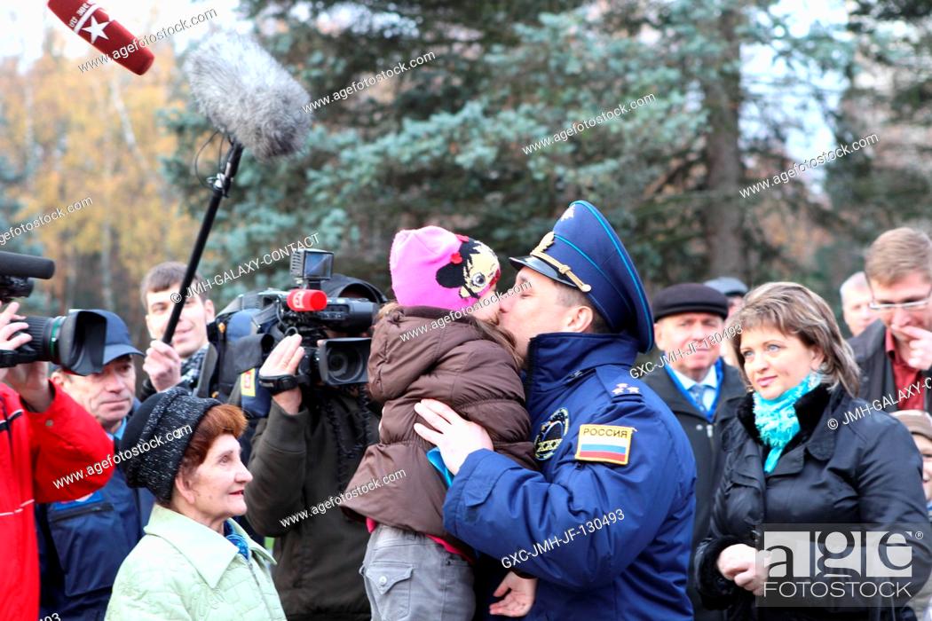 Stock Photo: At the Gagarin Cosmonaut Training Center in Star City, Russia, Expedition 2930 Soyuz commander Anton Shkaplerov says goodbye to family members on Oct.