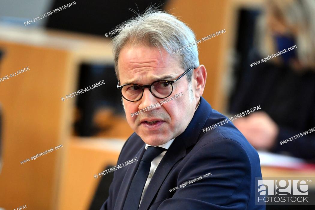 Stock Photo: 15 December 2021, Thuringia, Erfurt: Georg Maier (SPD), Minister of the Interior of Thuringia, speaks in the plenary hall during the session of the Thuringian.