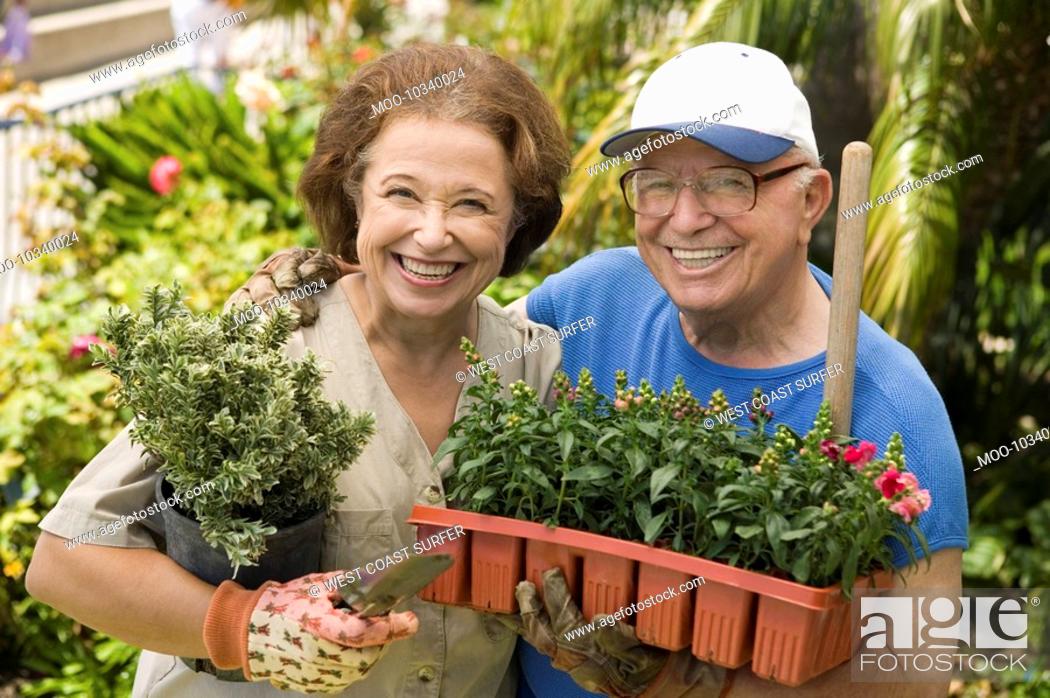 Stock Photo: Senior couple gardening portrait.